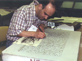Arturo Herrera draws in the studio.