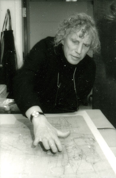 Artist Dennis Oppenheim works on his print at the Normal Editions Workshop in 1992.
