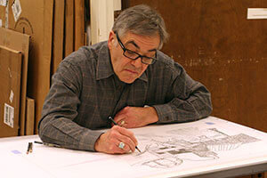 John Himmelfarb draws in the studio.