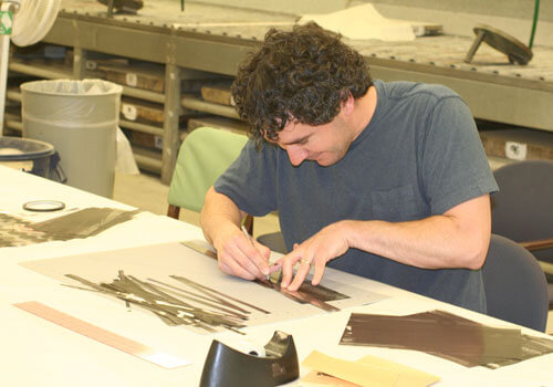Artist Michael Wille works on his print at the 2008 Normal Editions Workshop.